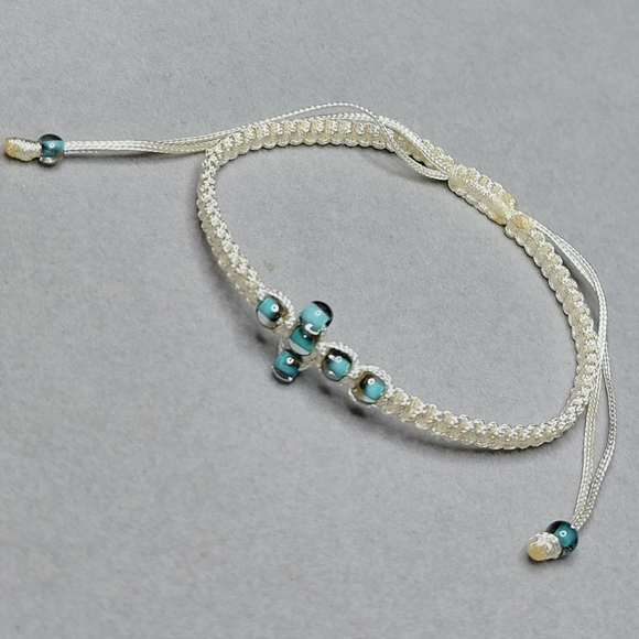 Hand Crafted Jewelry - Teal Glass Beaded Cross Woven Cream Adjustable Bracelet